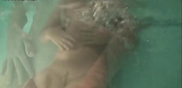  Slightly hairy teen Olga Kukuruzina masturbates in the pool